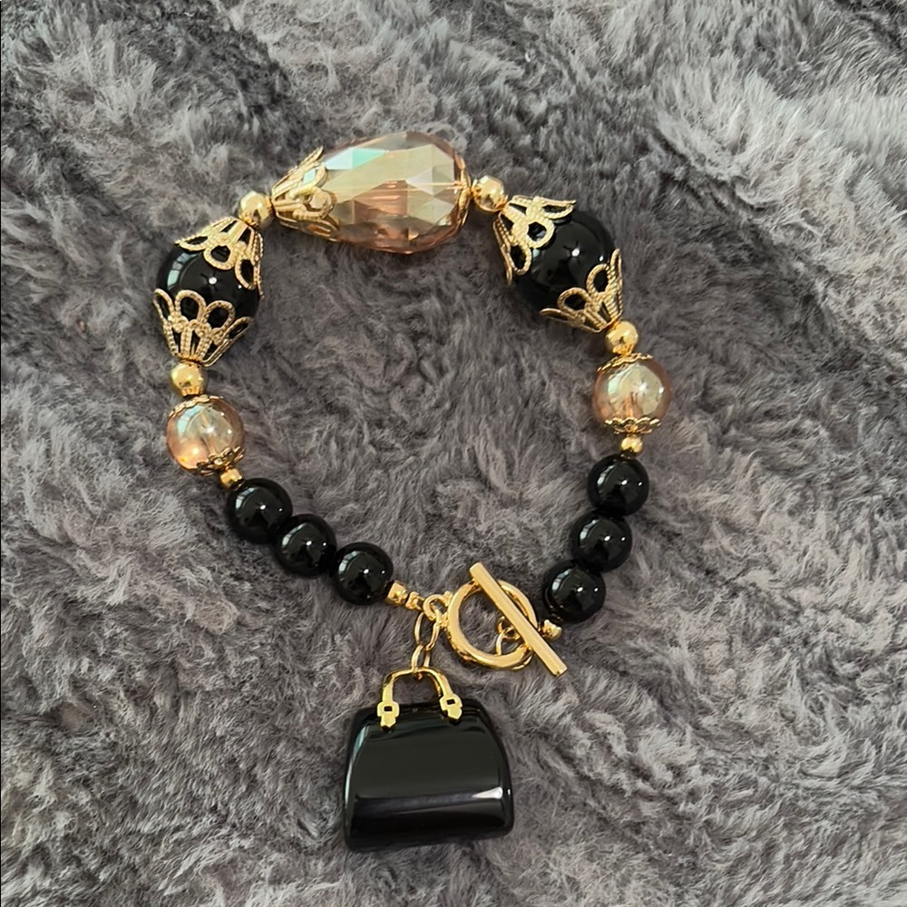 Elegant Black and Gold Bracelet
